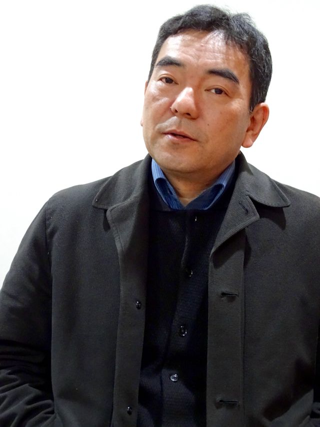 暉峻氏