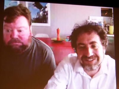 Skypeの記者会見で語るプロデューサーのティム・カーク（左）、ロドニー・アシャー監督（右）